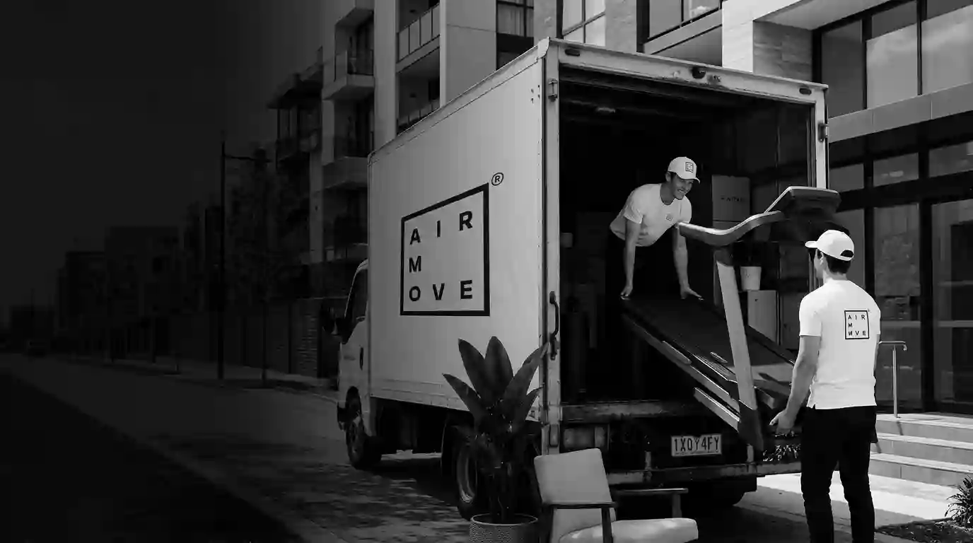 Movers_loading_treadmill_into_truck
